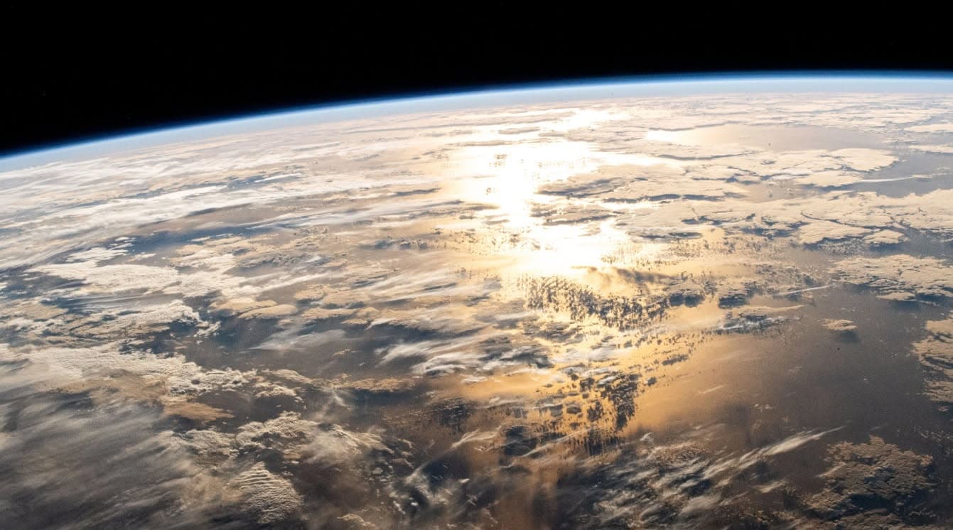 The Atlantic Ocean and Earth's thin blue atmosphere photographed from the International Space Station
